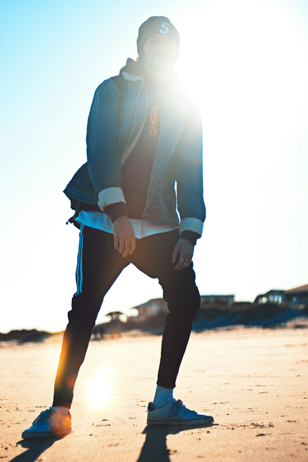 man standing on brown soil during daytime