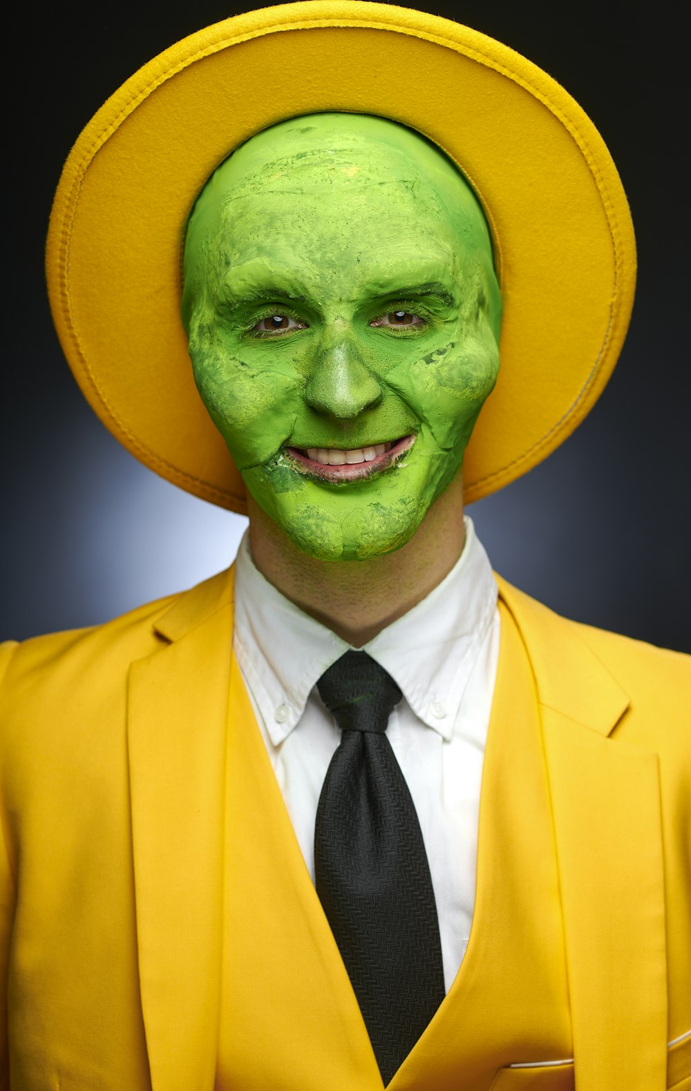 man wearing green mask