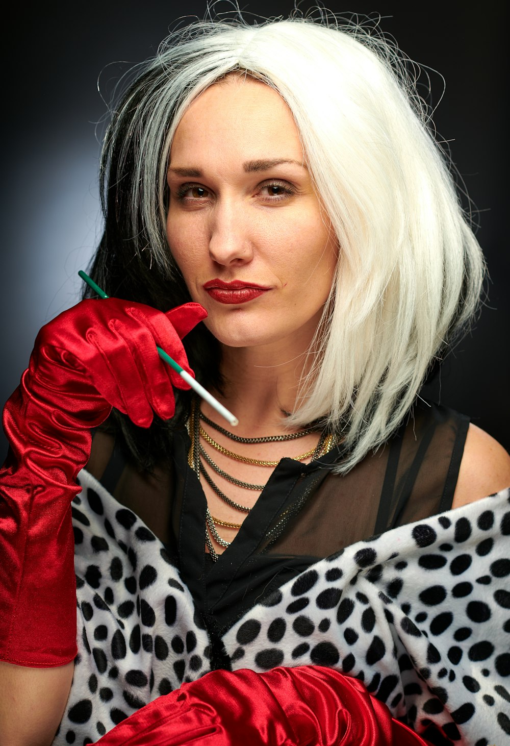 woman wearing Cruella de Vil costume