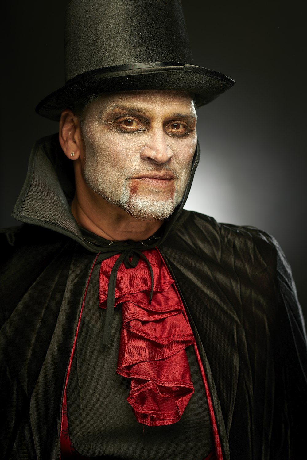 man wearing vampire costume