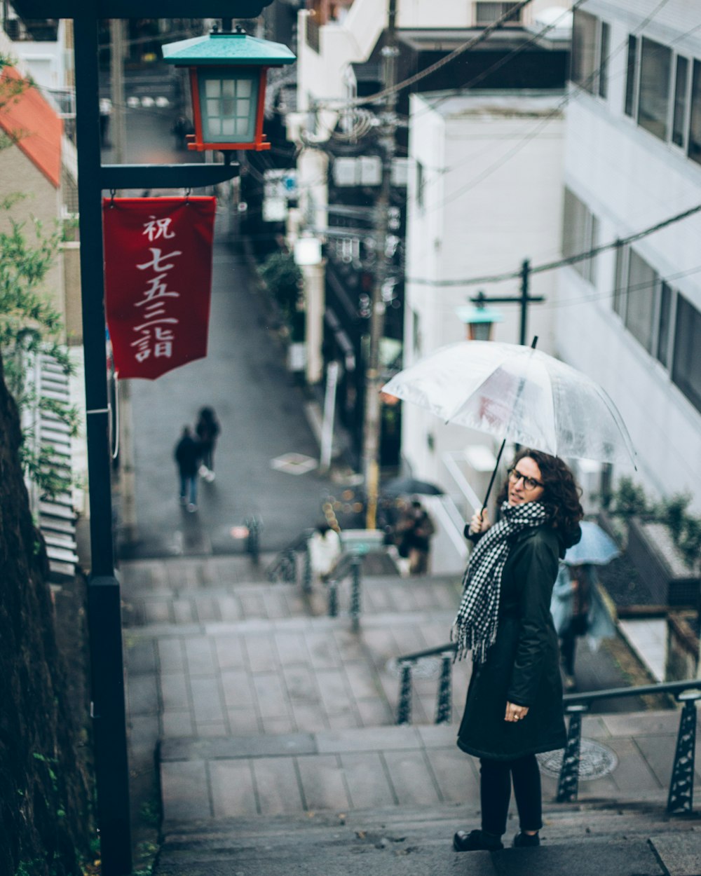 woman standing on stairs