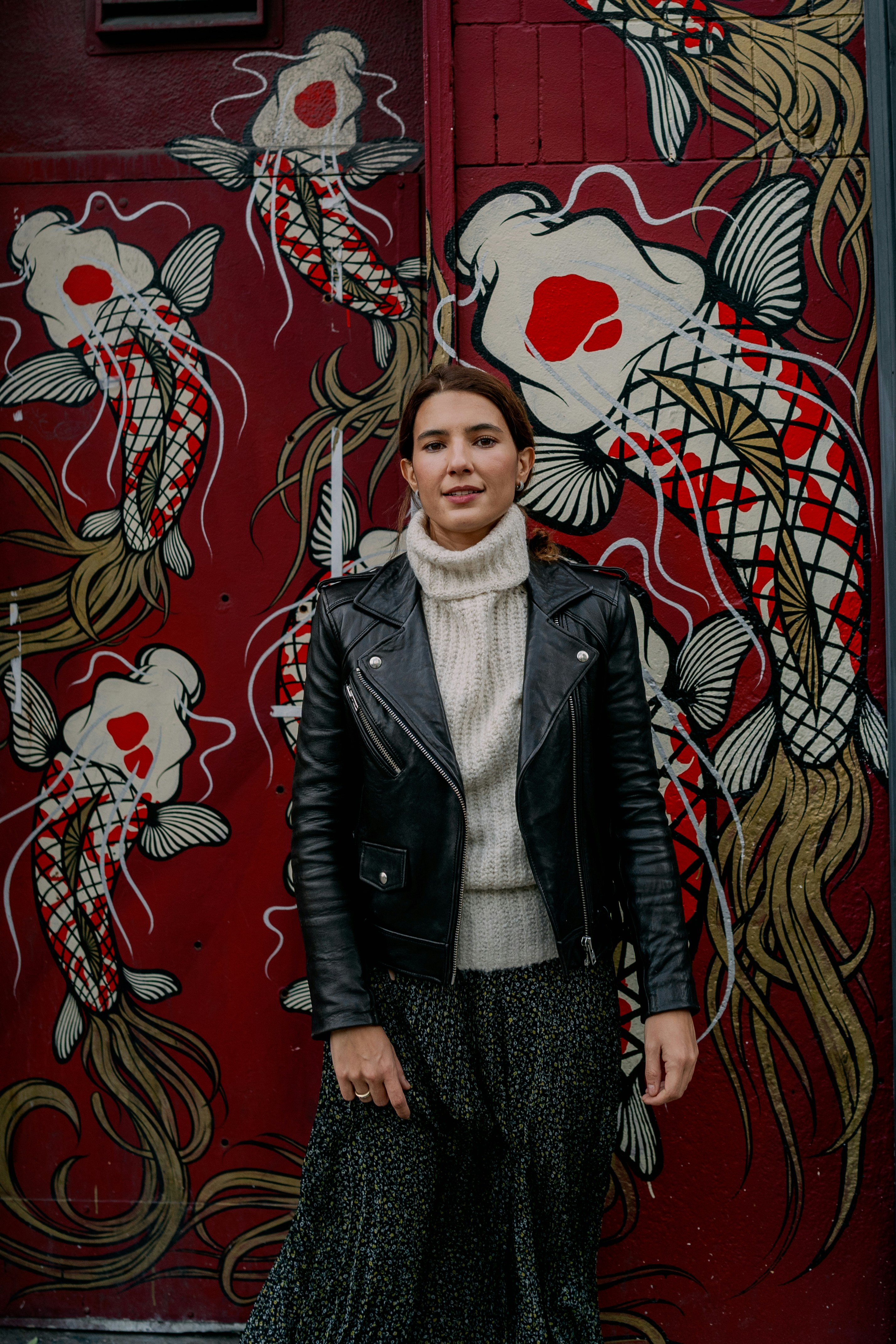 woman wearing yellow long-sleeved dress under white clouds and blue sky during daytime