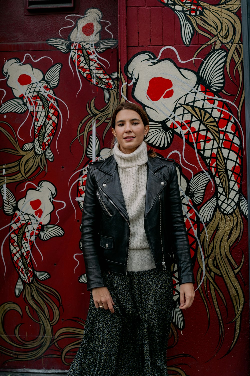 woman wearing black leather jacket