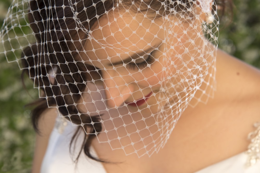 woman wearing white veil