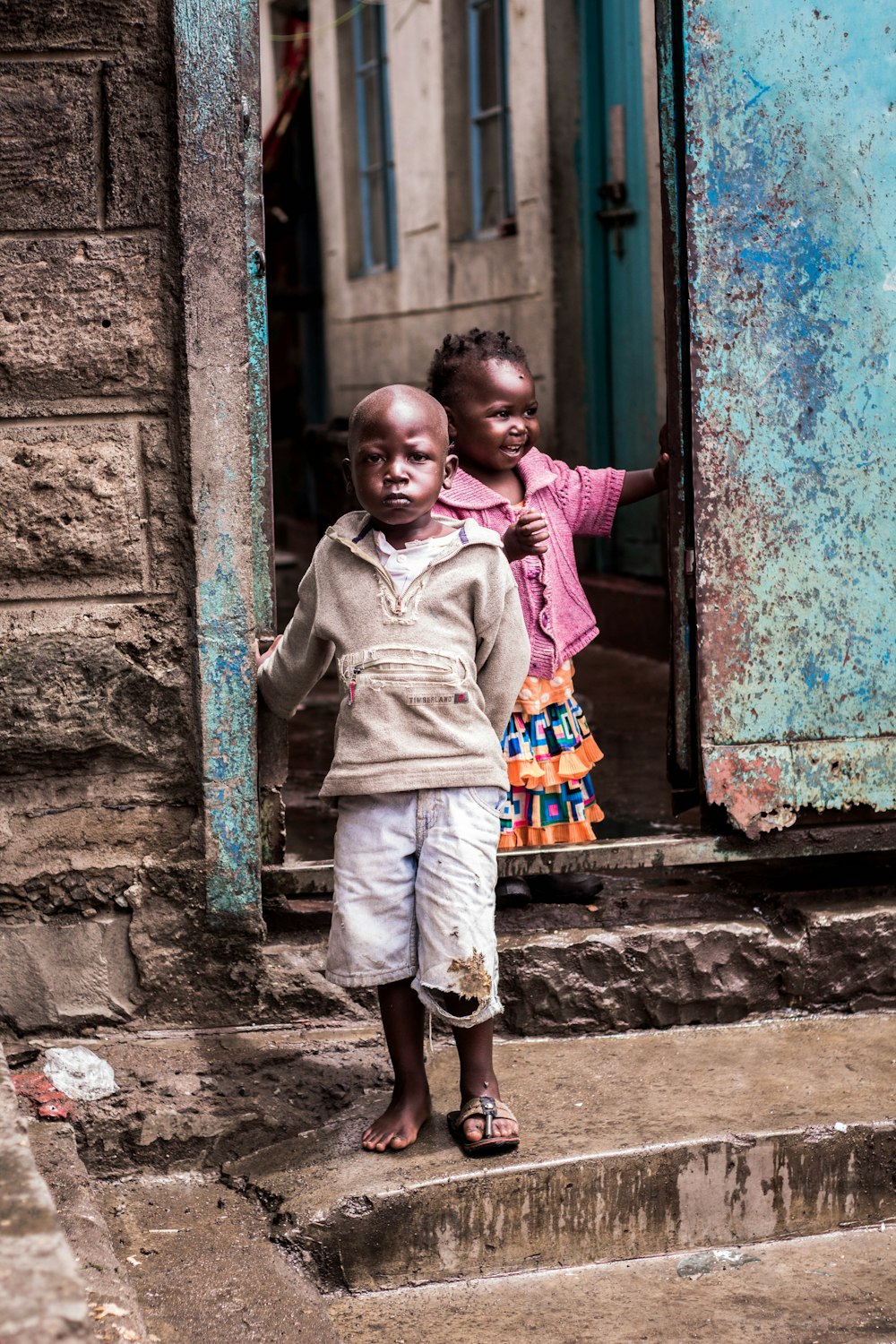 boy and girl near door