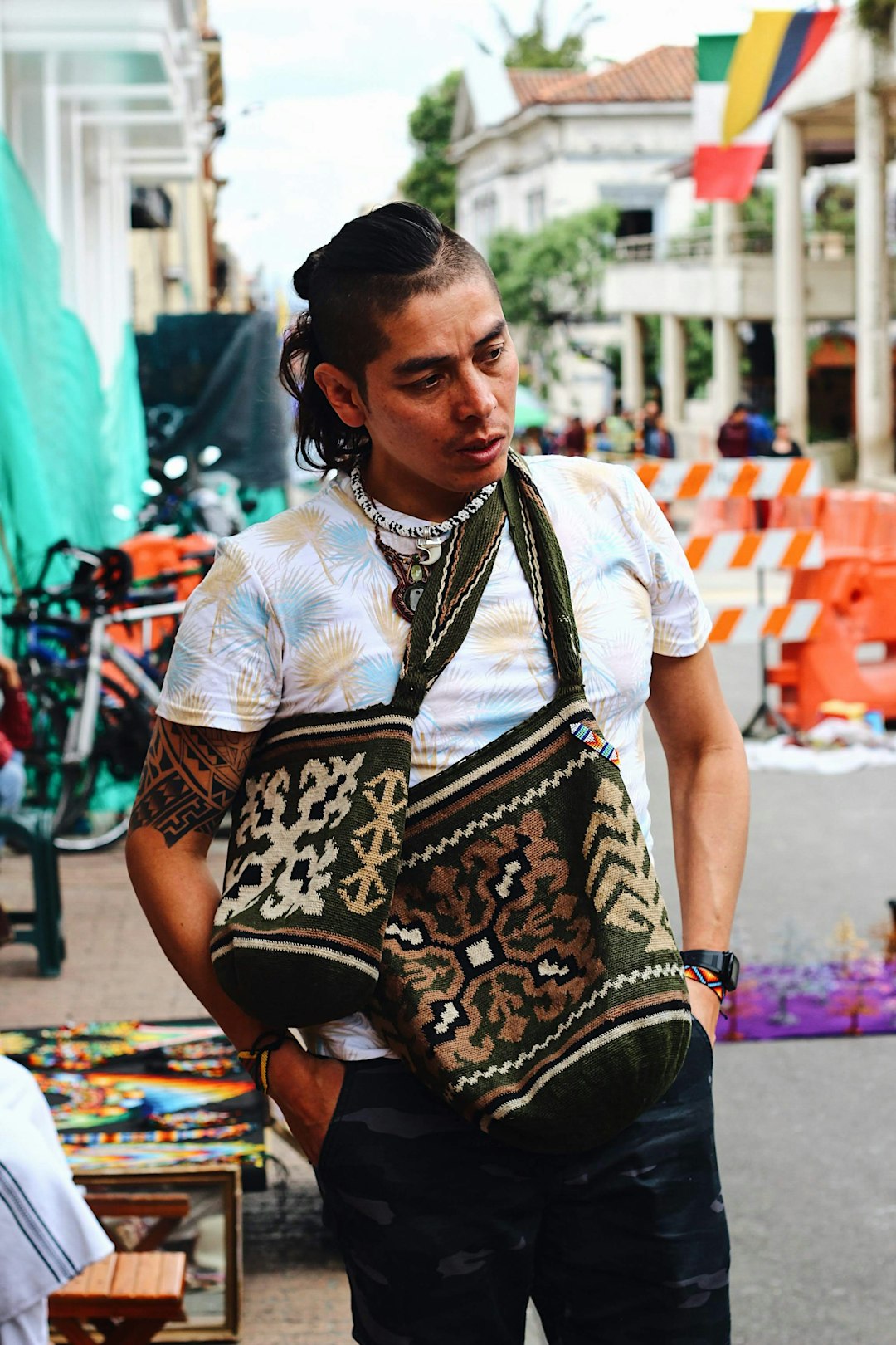 man wearing white and blue printed shirt