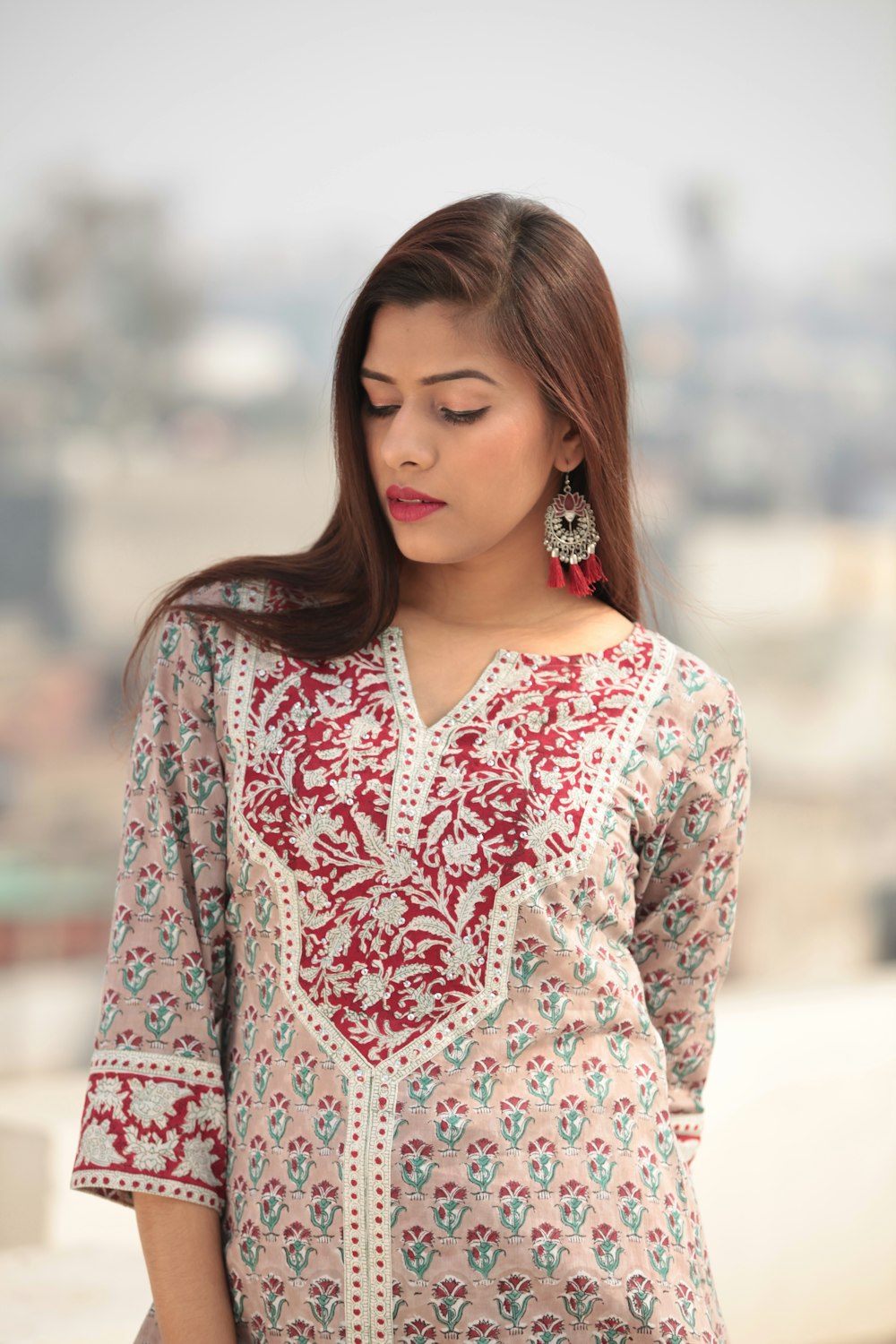 shallow focus photo of white and red floral quarter-sleeved shirt photo ...