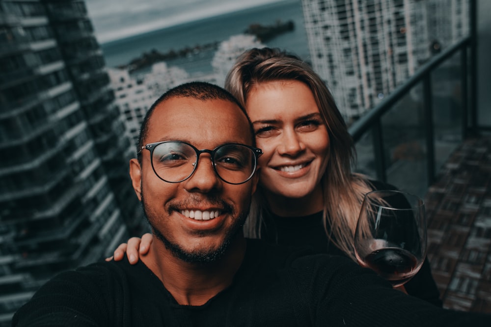 couple standing near fence