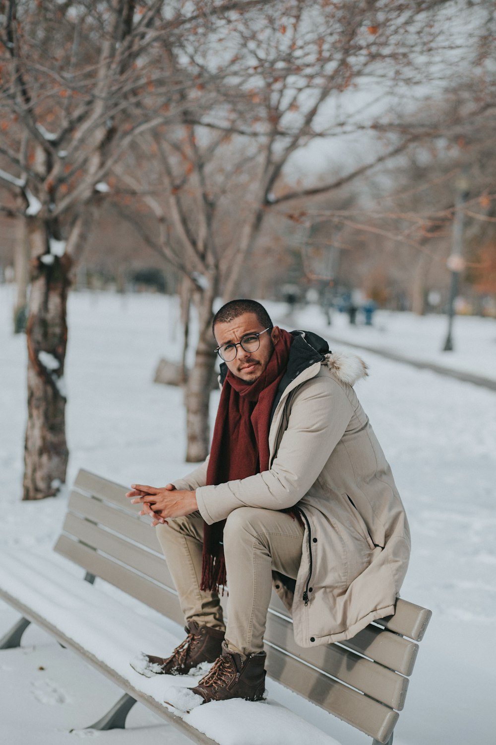 man sitting on bench