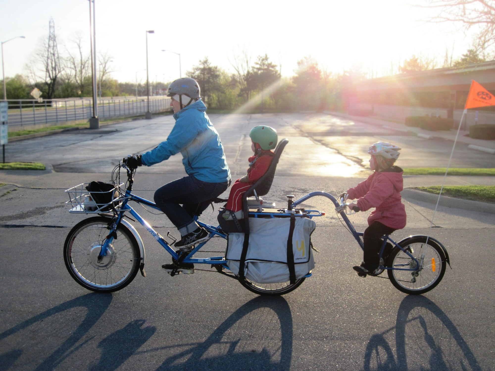 Family bike ride on a cargo bike. 