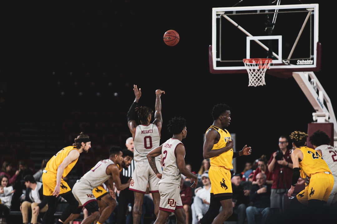 man shooting the ball on the free throw line