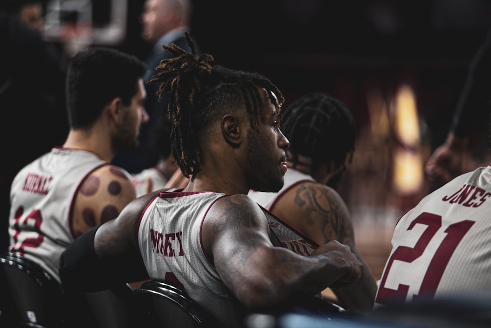 Basketball Players Sitting On Bench Photo Free Skin Image On