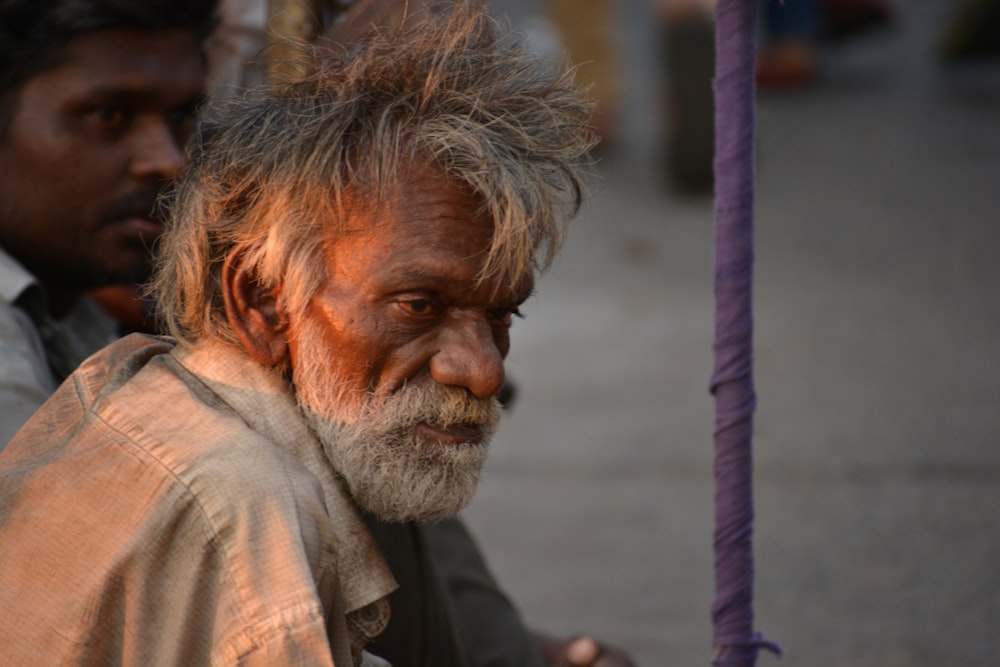 man wearing grey top