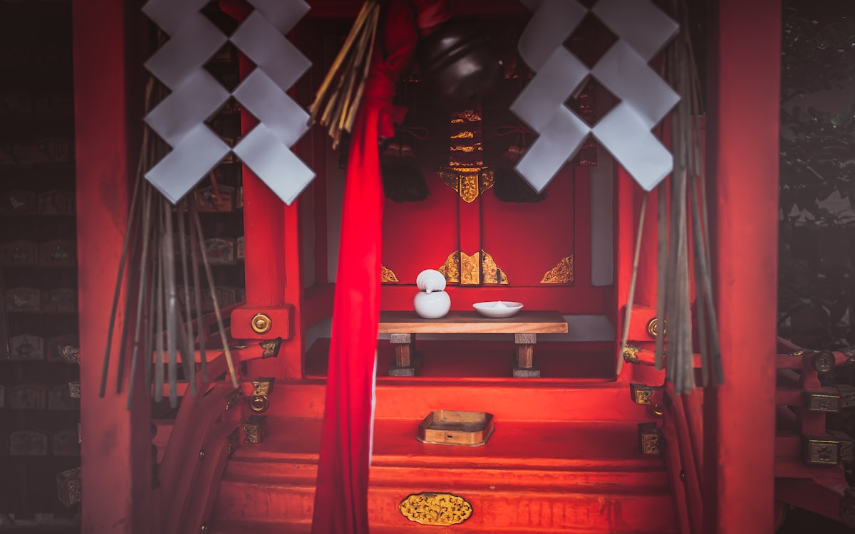 red and gold wooden cabinet