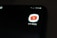 A smartphone screen displaying the YT Kids app icon, which features a red play button inside a white rounded square. The icon is prominently displayed against a dark background, with a battery icon at the top right corner showing 70% charge.