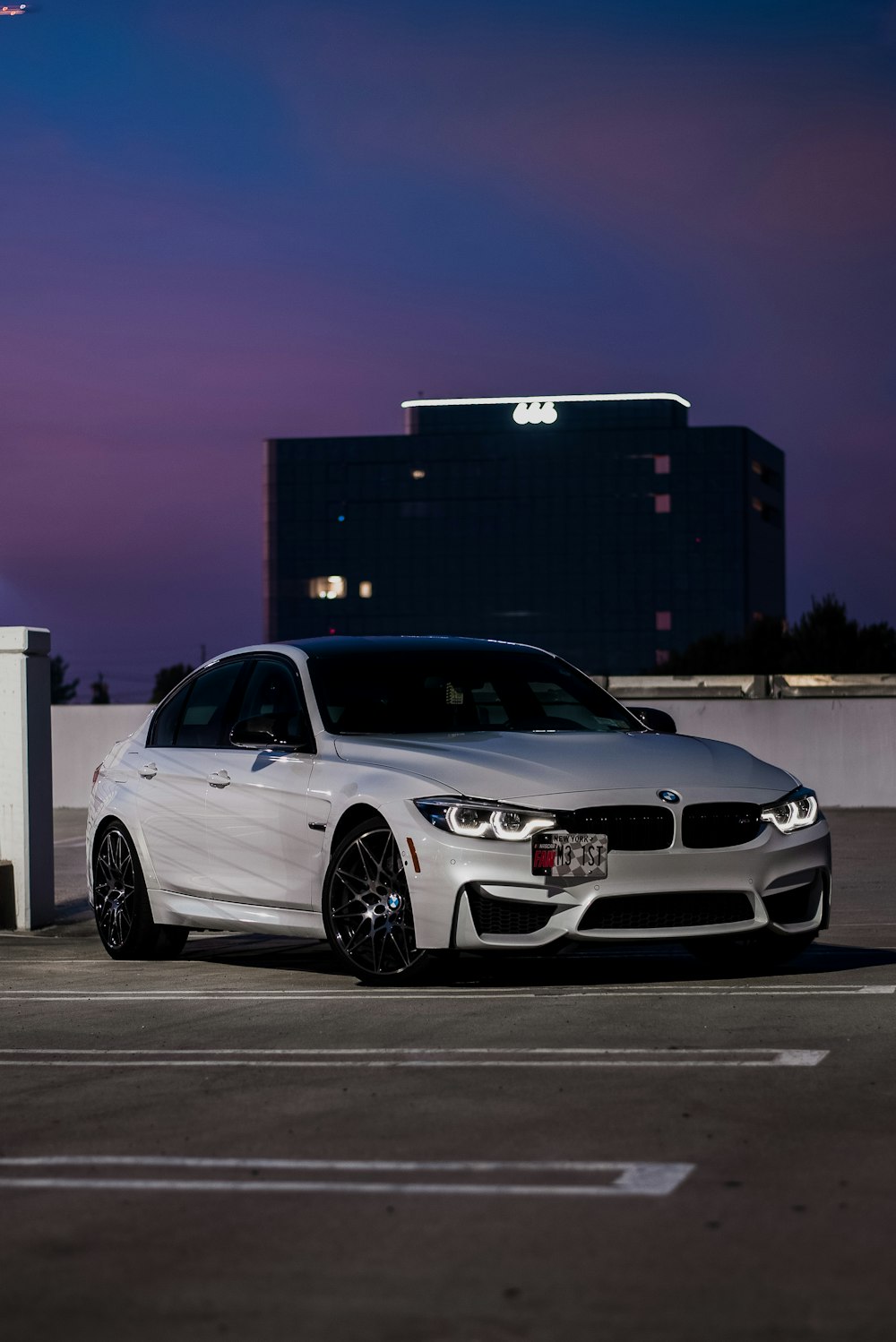 white BMW sedan