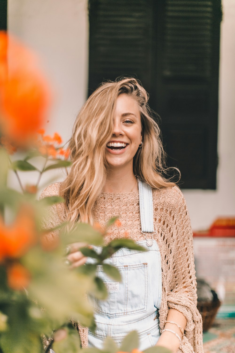 woman in denim overall pants