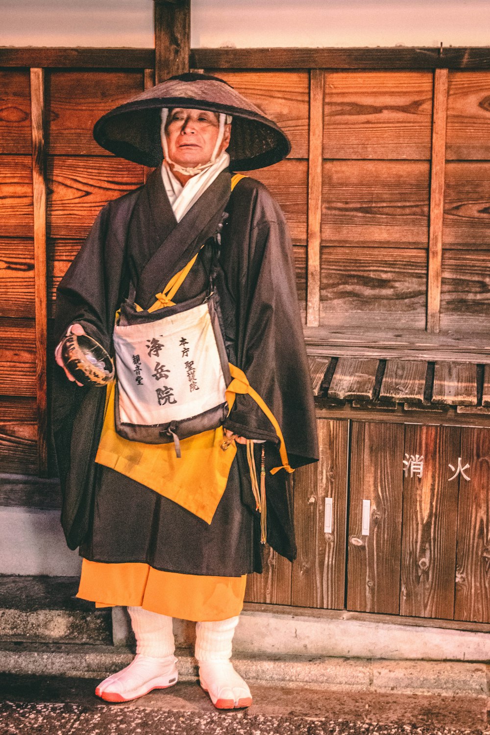 a man dressed in a traditional japanese costume