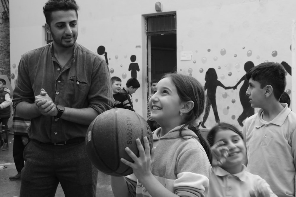 girl holding the ball