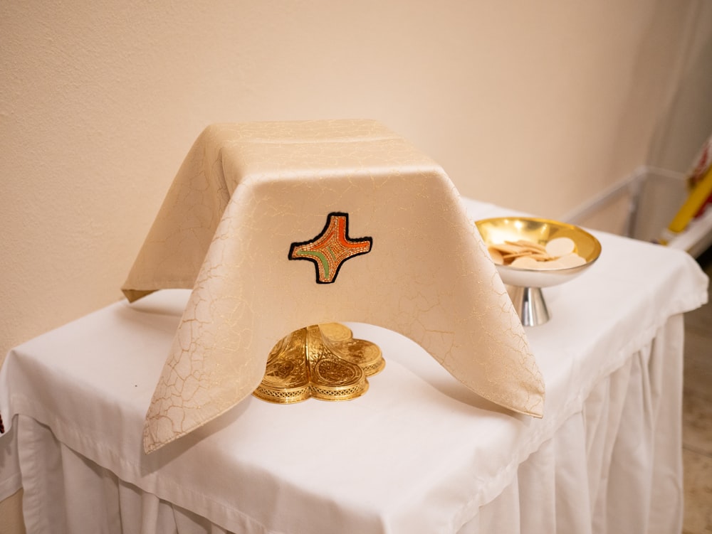 gold-colored catholic communion items