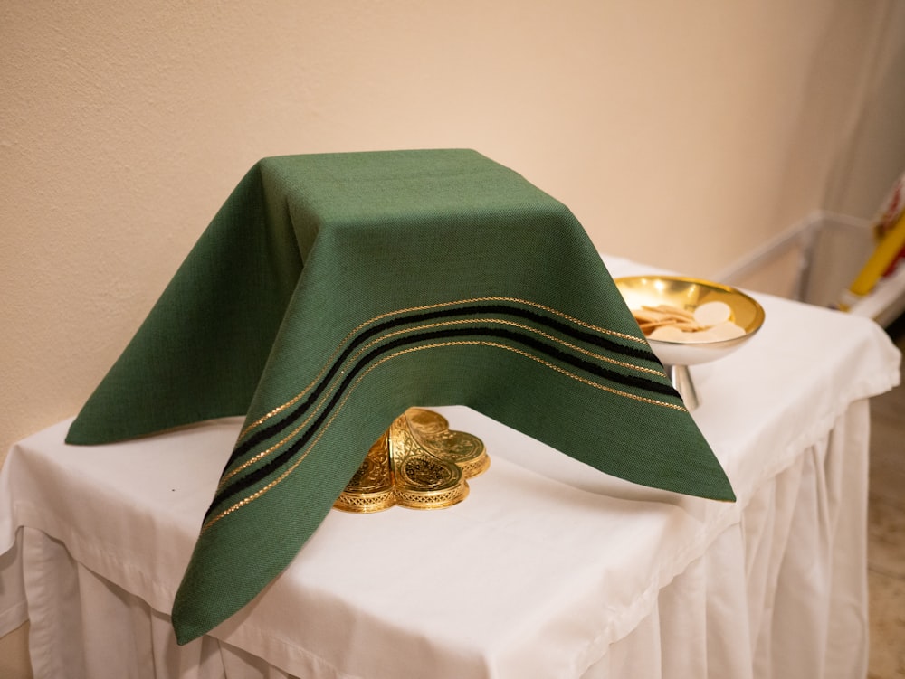 green Holy communion on table