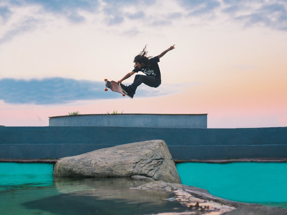 man skateboarding during daytime