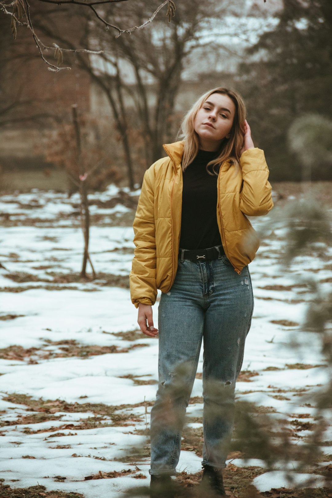 selective focus photography of woman standing near outdoor during daytime