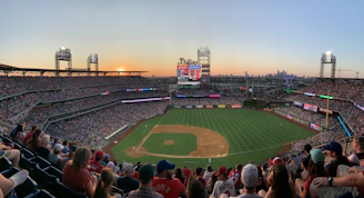 A community event with families enjoying baseball games together.