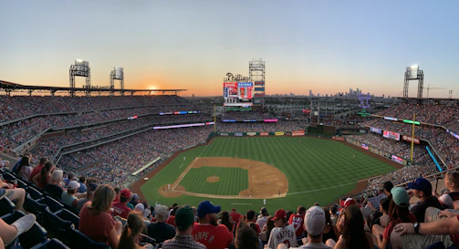 A community event with families enjoying baseball games together.