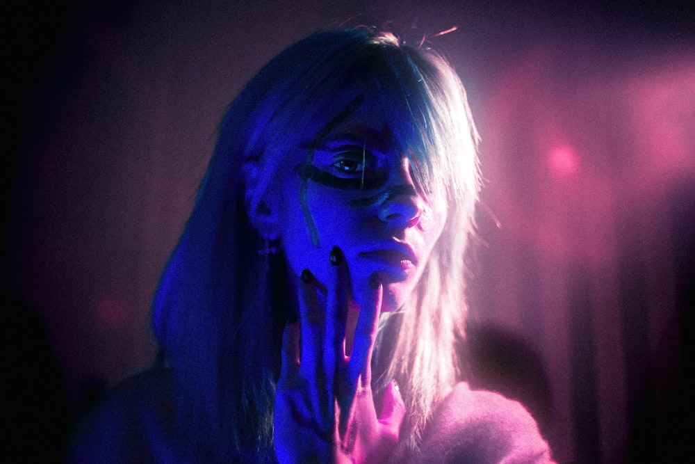 Woman With Purple Hair And Black Eyes Photo Free Human Image On