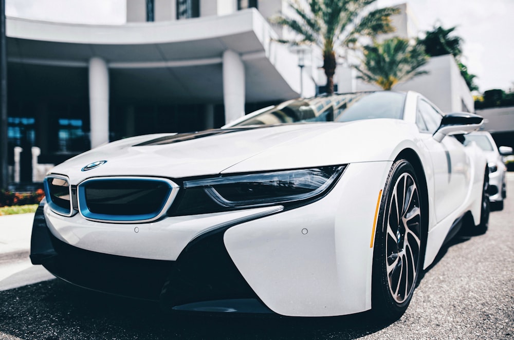 white lamborghini aventador in a parking lot