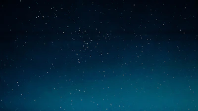 A serene night sky filled with stars, inviting wonder and a sense of infinite possibility.