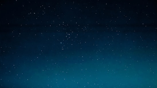 A serene night sky filled with twinkling stars forming a subtle heart shape, evoking a sense of calm and cosmic connection.