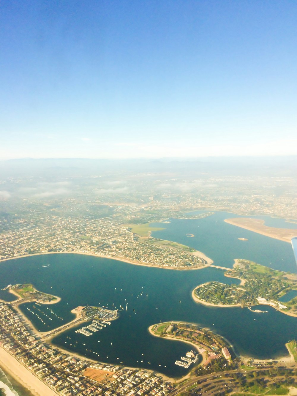 aerial view of green and brown field during daytime