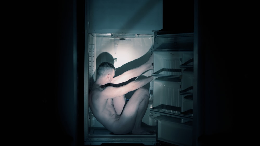 naked woman in the refrigerator
