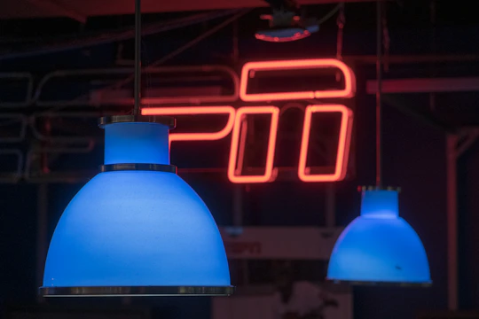 A vibrant restaurant website preview with glowing blue-purple accents and smooth hover animations.