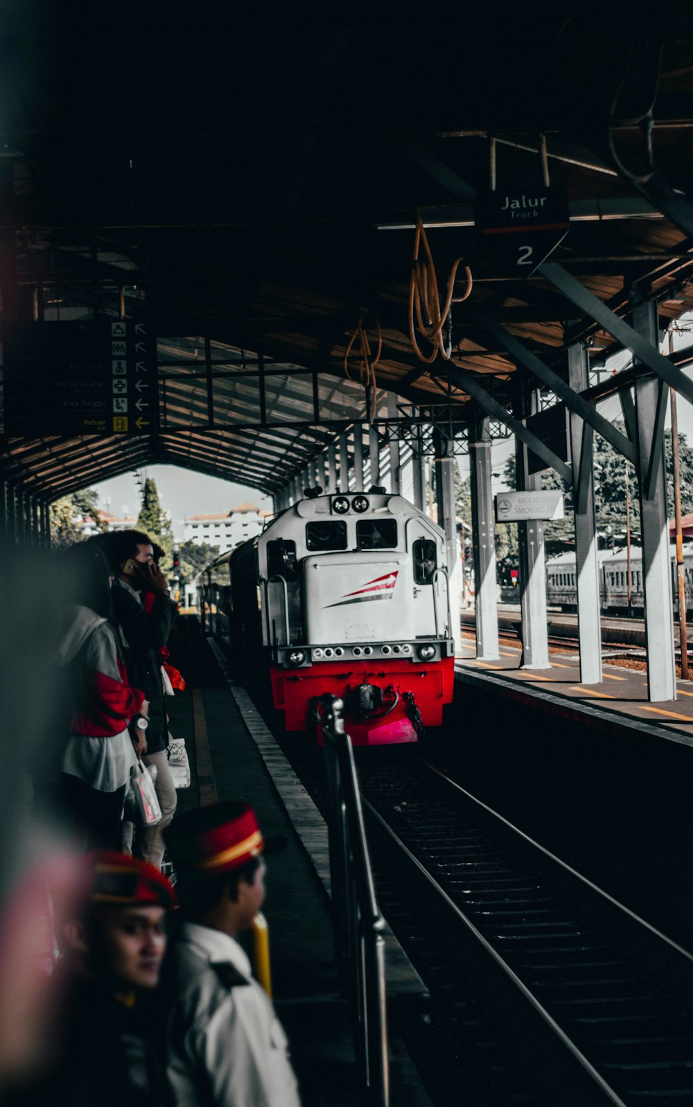 people walking on train station during daytime