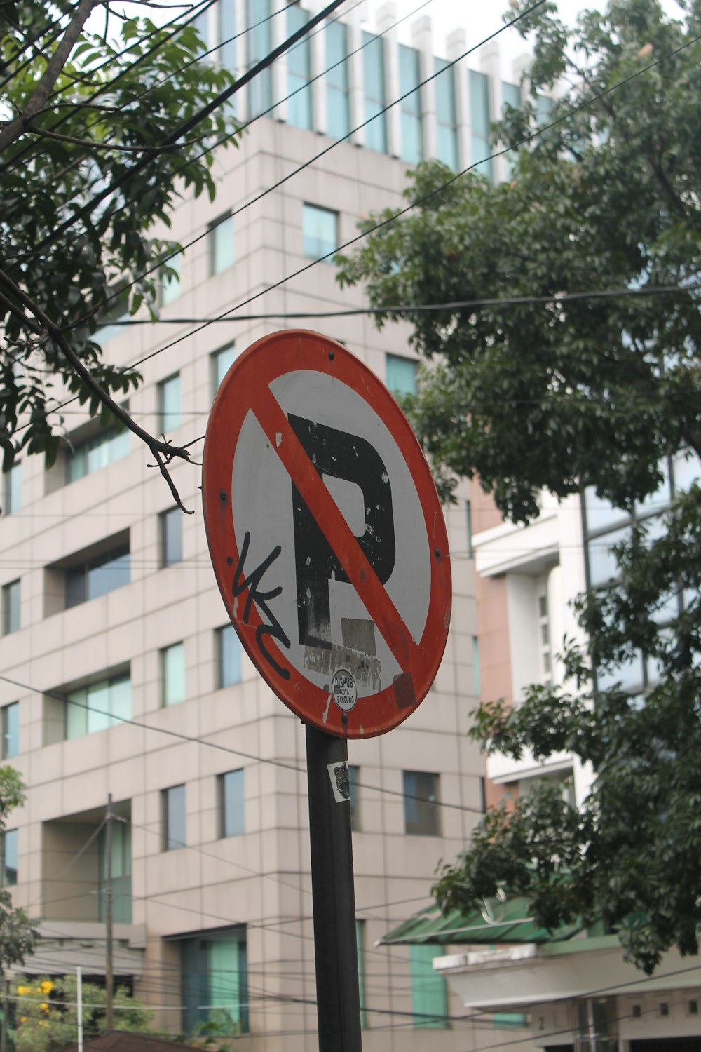 red and white no smoking sign