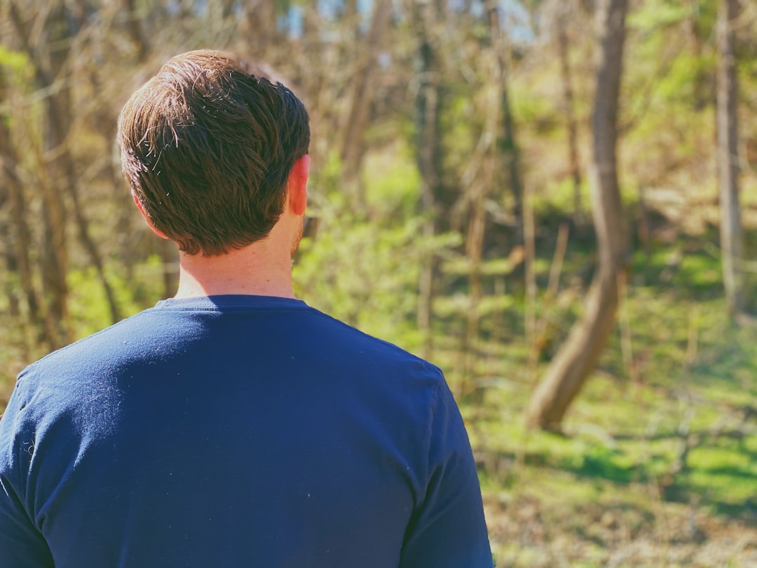 back of man head and shoulders
