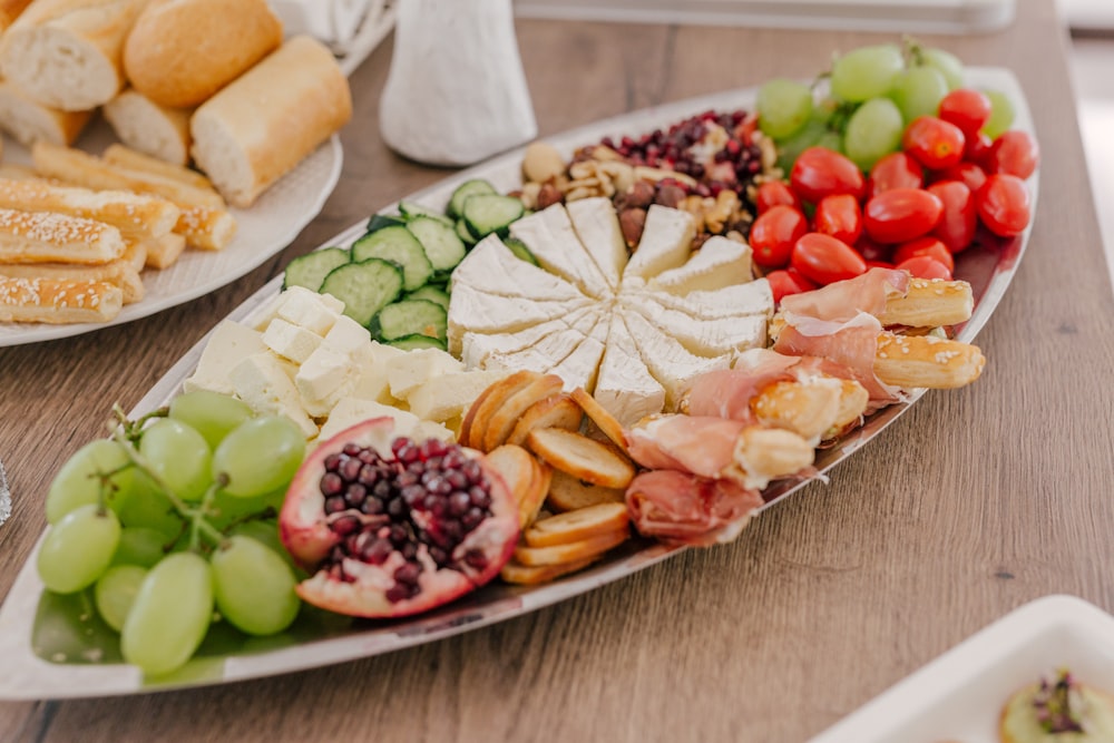 sliced fruits on white ceramic plate