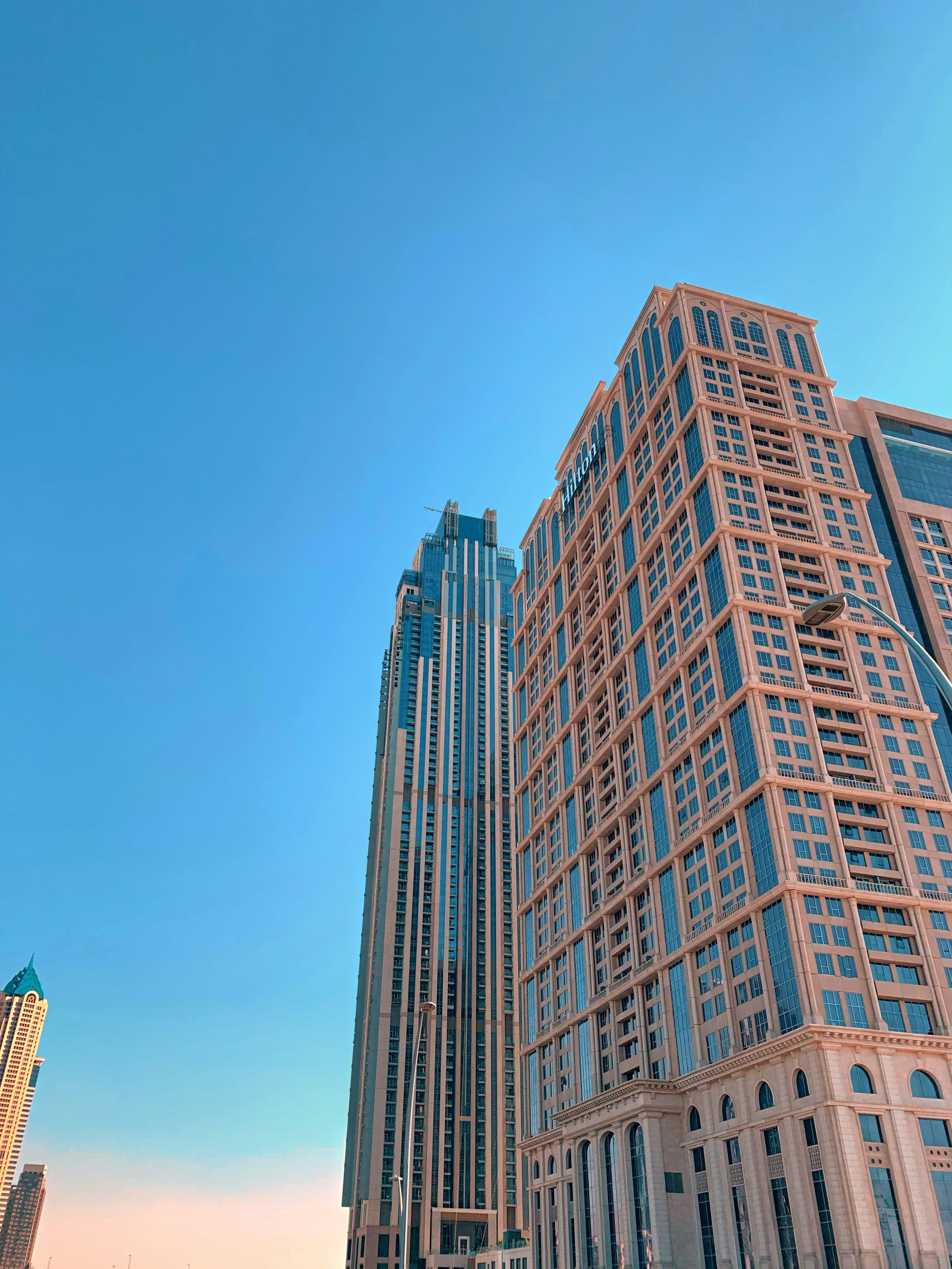brown concrete building under blue sky during daytime