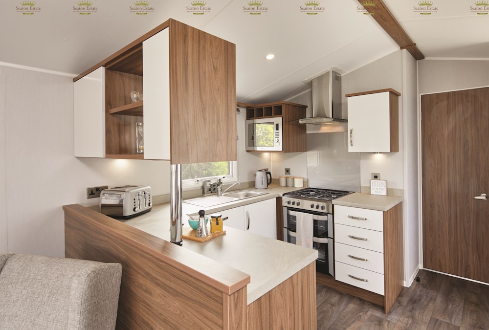 white and brown kitchen cabinet