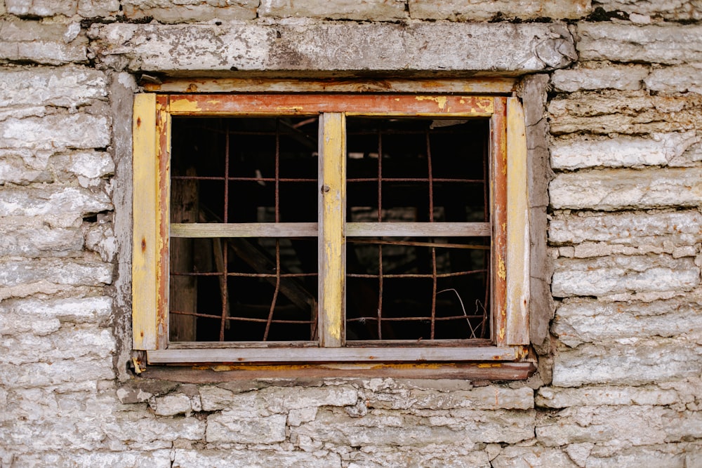 brown wooden framed glass window