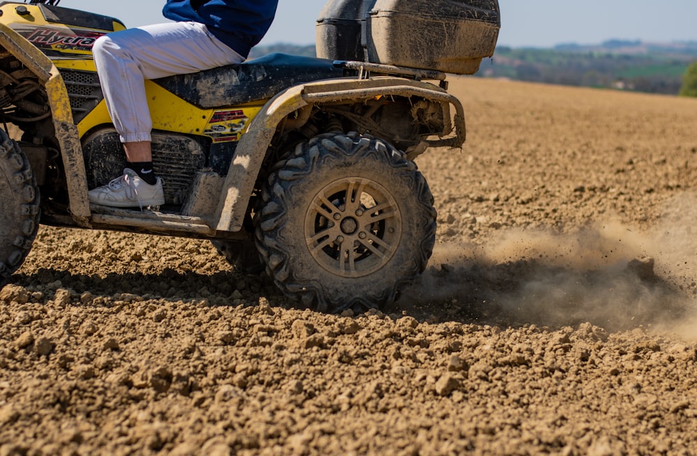 person riding on black atv