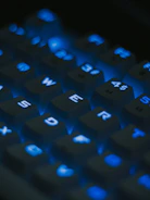 Visual keyboard highlighting home row keys glowing softly in blue