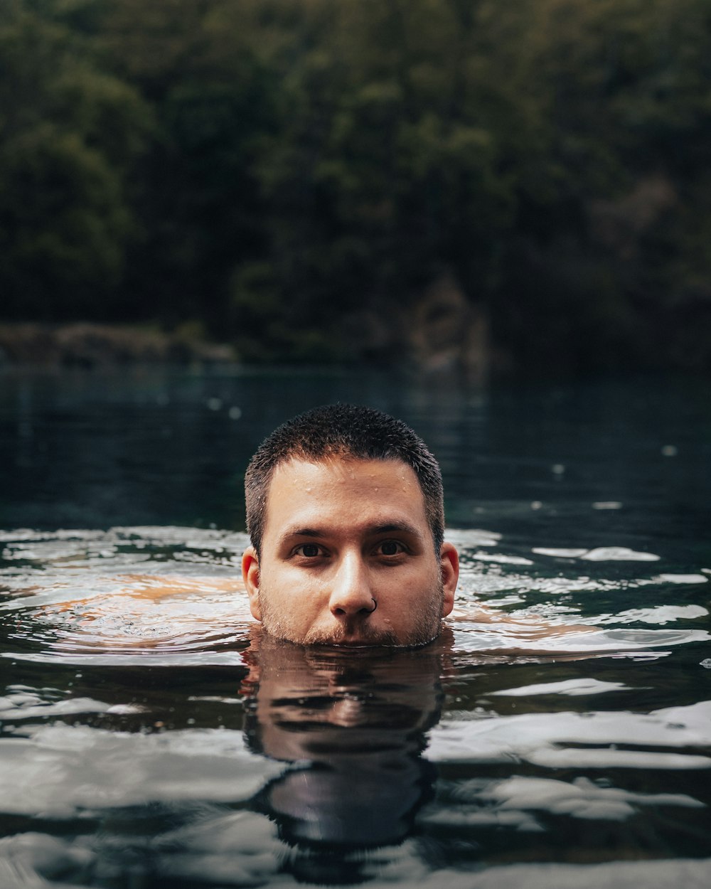 man in water during daytime
