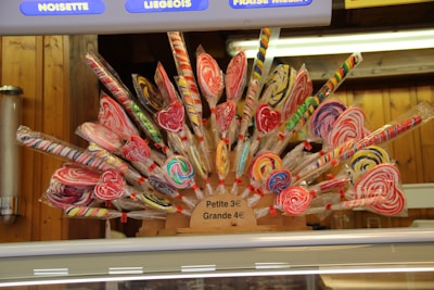 A vibrant display of lollipops in different flavors and colors.