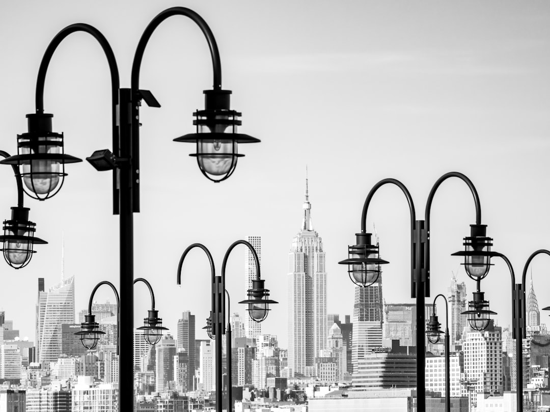 grayscale photo of city skyline during daytime