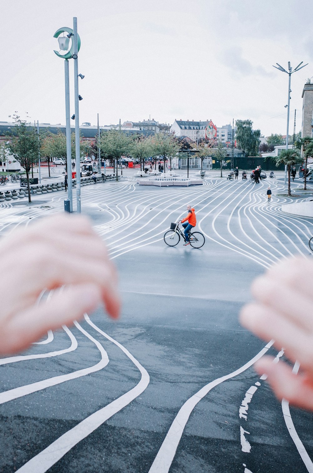 people riding bicycle on road during daytime