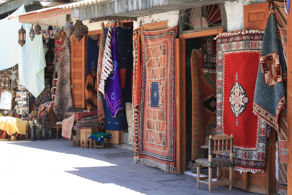 red blue and white tribal print textile on brown wooden chair